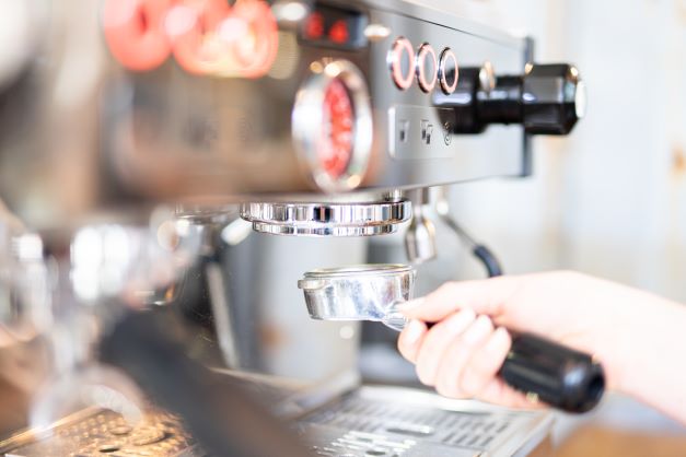 Preparing a shot of espresso at 19grams alex cafe at Alexanderplatz