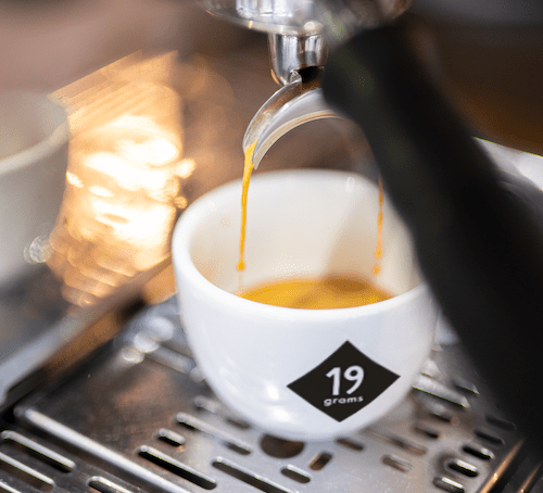 19grams espresso being poured into a 19grams espresso cup