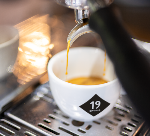 19grams espresso being poured into a 19grams espresso cup