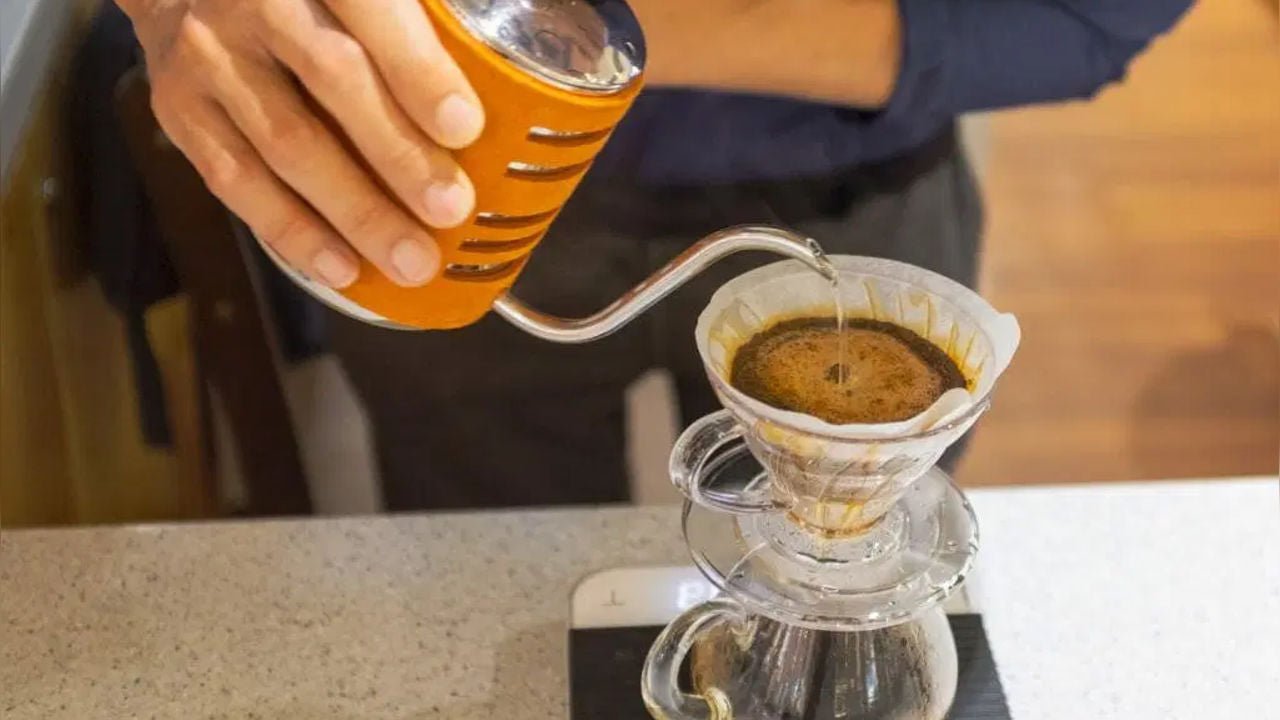 Saturate the coffee Bed in V60